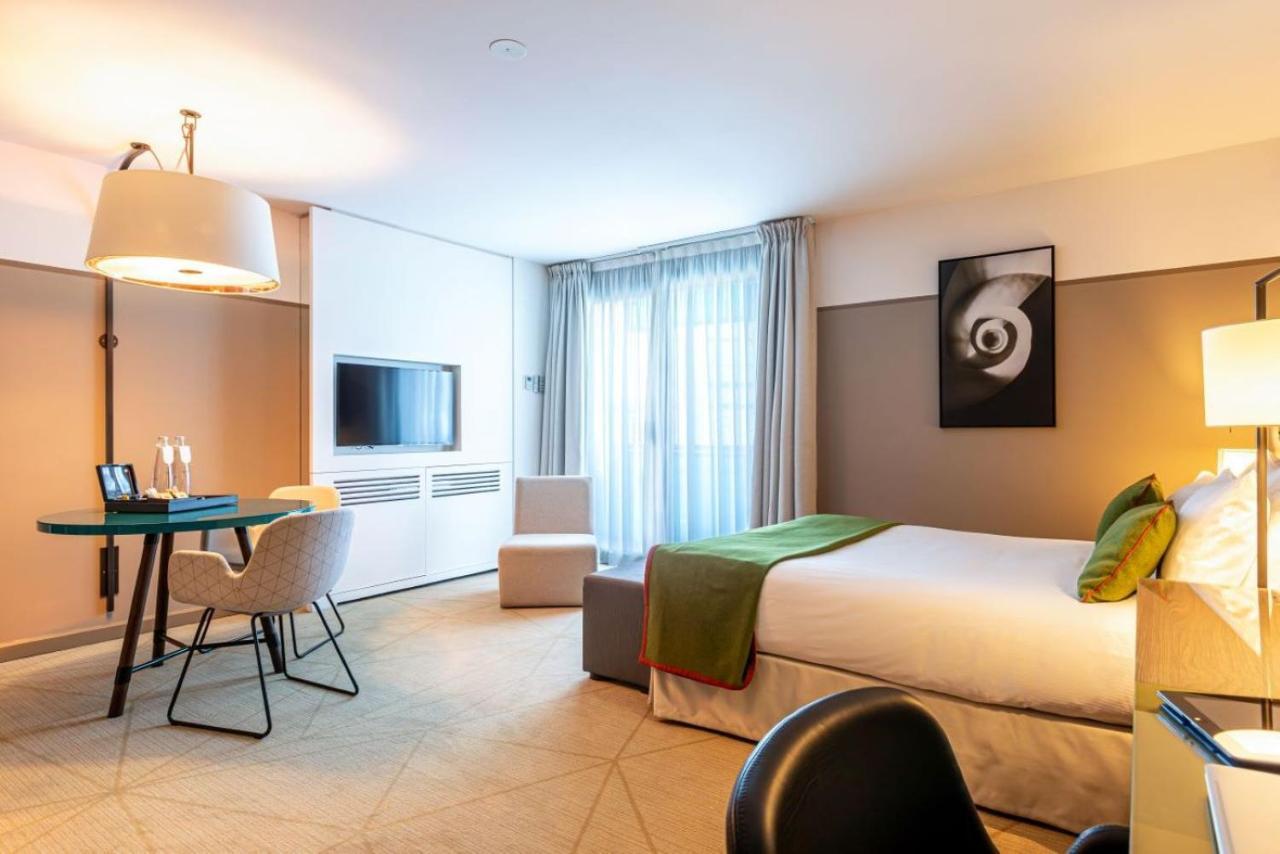 Fraser Suites Paris La Defense Курбьовоа Екстериор снимка A room at the hotel